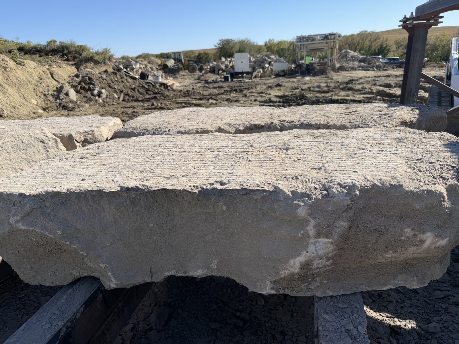 Same ledge stone after milling, showing a clean flat horizontal face