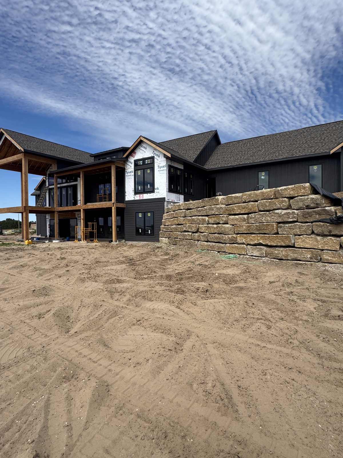 14" Premium Natural Tan retaining wall at a new custom home