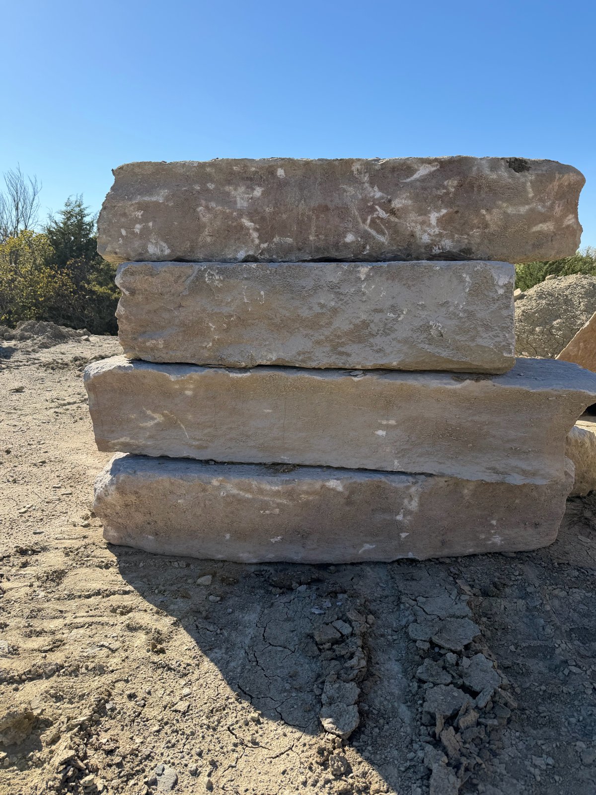 Single-sided milled Sundown Ledge blocks stacked at the yard